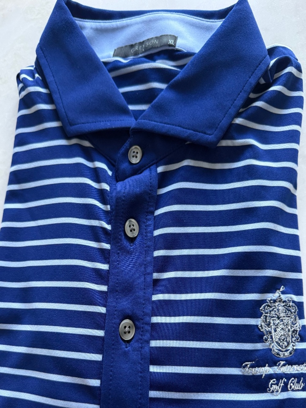 Man’s golf shirt by Greyson.  XL. Trump International Logo on sleeve